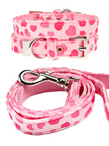 Pink Hearts Fabric Collar & Lead Set - This Pink Hearts collar & lead set is a perfect girly accessory. It is a contemporary style and the pattern is on trend. It is lightweight and incredibly strong. The collar has been finished with chrome detailing including the eyelets and tip of the collar. A matching lead, harness and bandana are a...