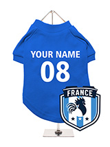 France Football Dog T-Shirt (Personalised) - Show your support for France with this personalised dog t-shirt. It 
features a stylish France rooster badge and allows for personalisation 
with your dog's name and team number. Made from lightweight, comfortable 
fabric, it keeps your dog feeling good. The t-shirt is machine washable 
for quic...